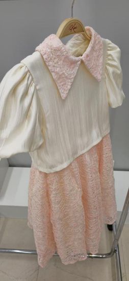 صورة طقم تيور الانيق بياقة مطرزة وتنورة دانتيل كلوش